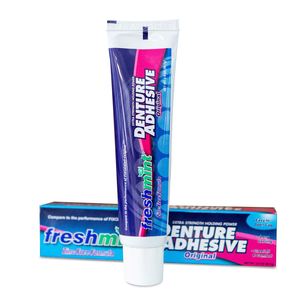 Six Freshmint 2 oz denture adhesive tubes bundled together