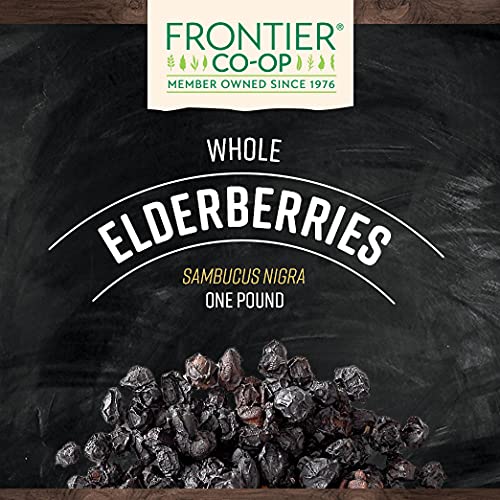 Close-up of dark purple dried elderberries