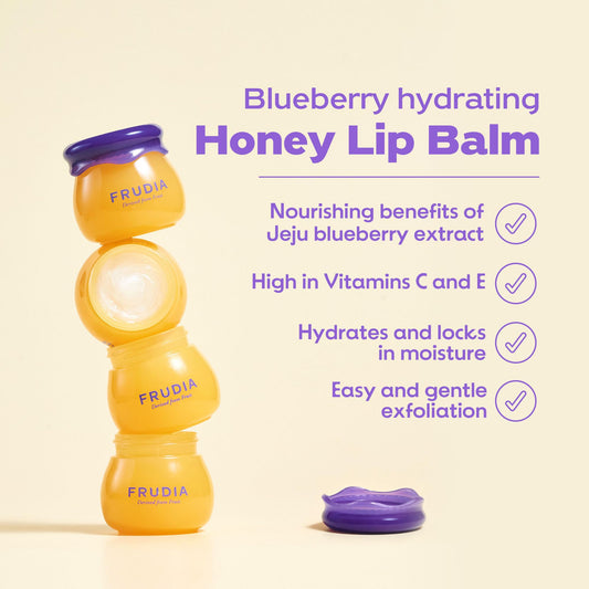 FRUDIA lip balm tube side view with branding and nourishment cue