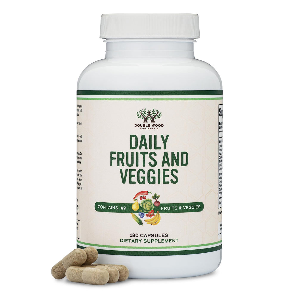 Bottle of Double Wood Fruits & Veggies Supplement on clean surface