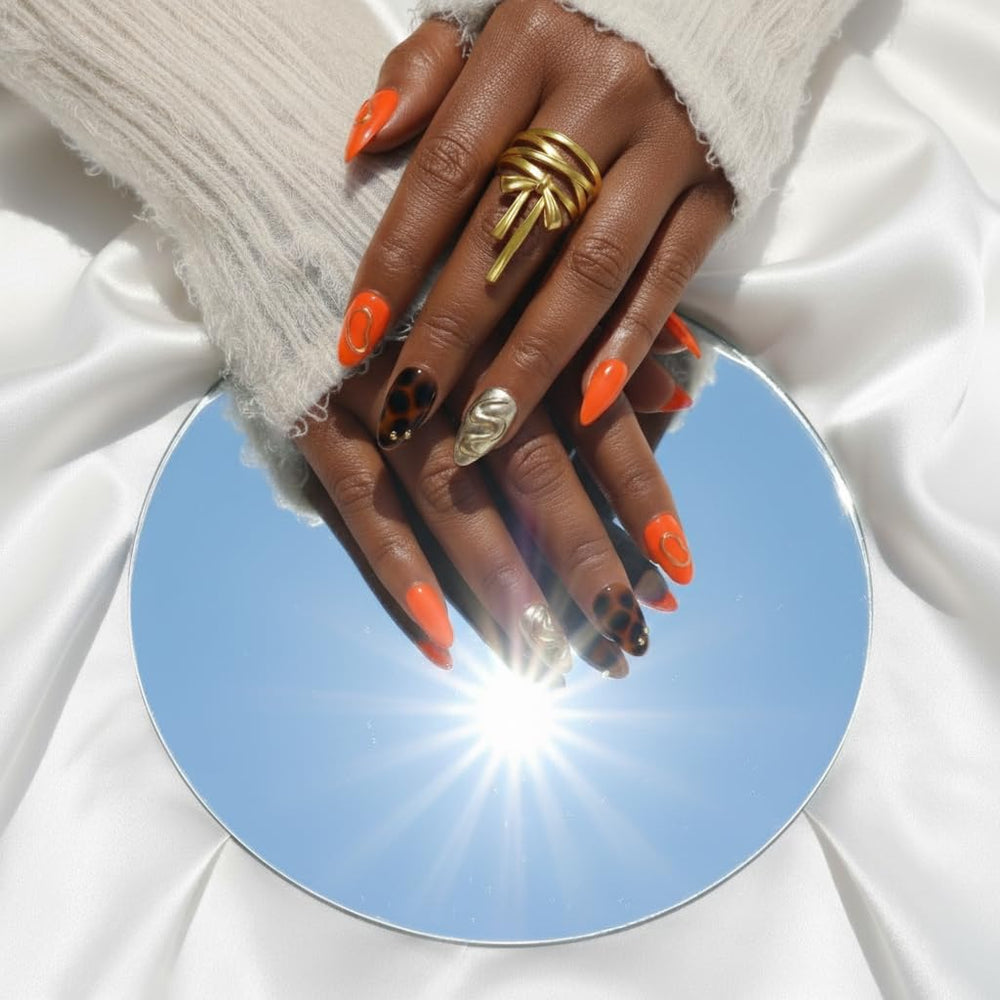 FURNUNUBI metallic gold almond nails adding luxe shine and glam