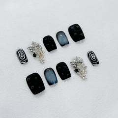 FURNUNUBI nails with 3D charms offer long-lasting color and versatile shapes.