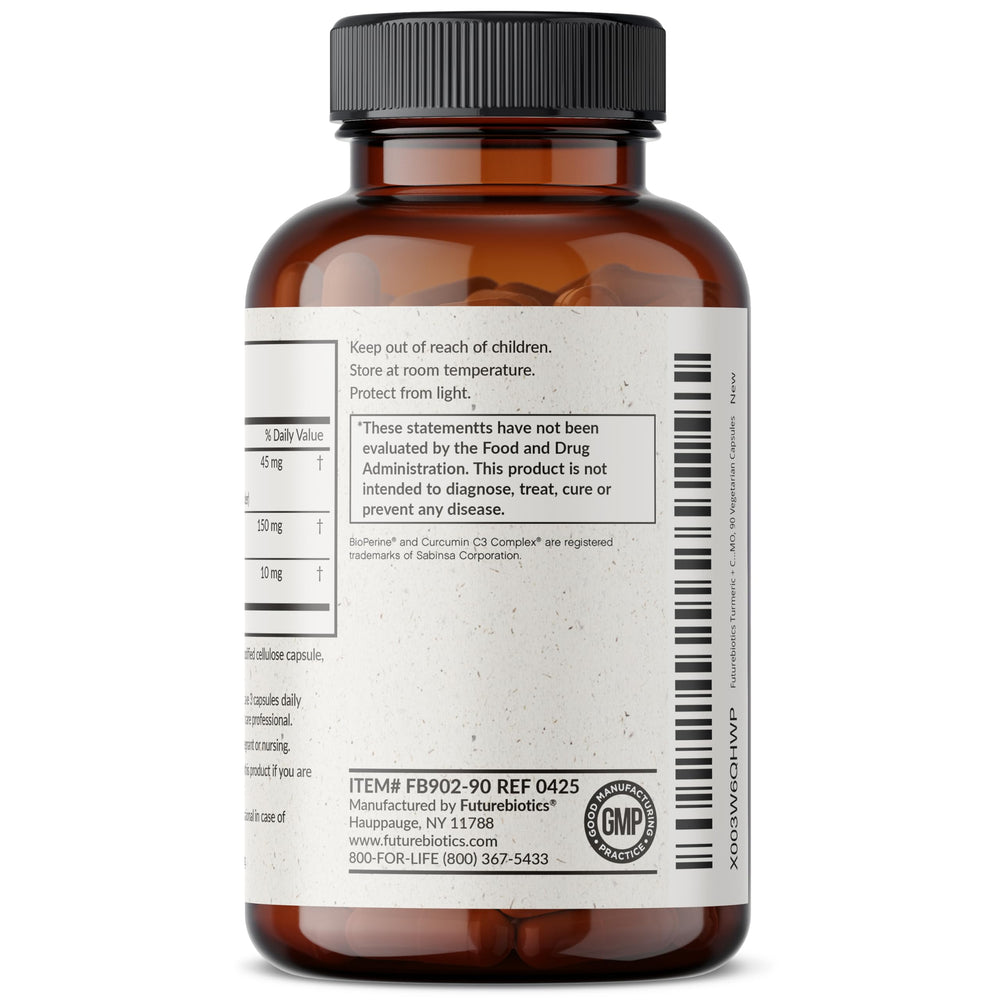 Close-up of capsules and turmeric powder texture