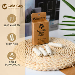 Reusable glass floss container with Gaia Guy silk floss refills