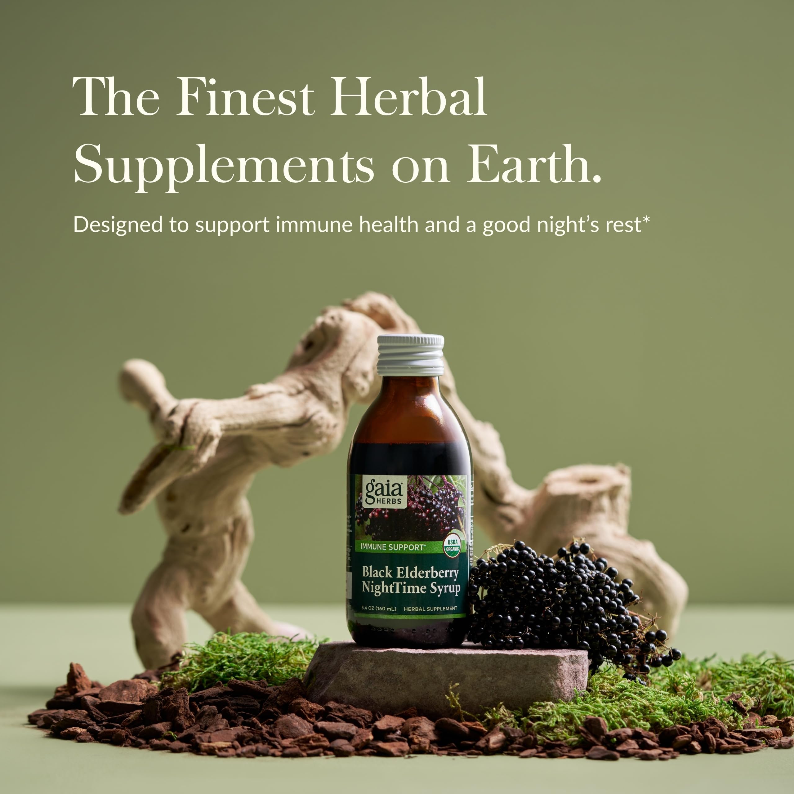 Pouring Gaia Herbs NightTime Syrup showing deep purple color