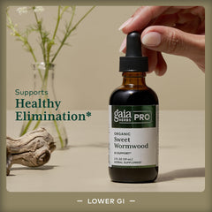 Gaia Herbs Pro Sweet Wormwood drops being measured
