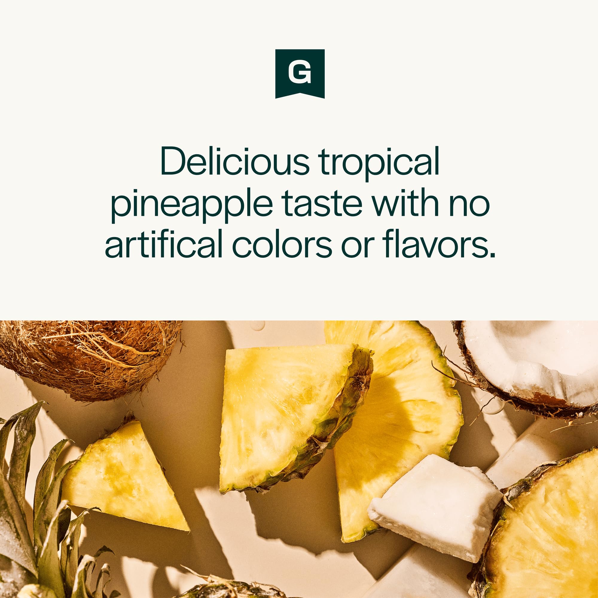 Close-up of vibrant green greens powder with Tropical Pineapple branding