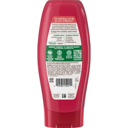 Garnier Whole Blends conditioner with cranberry extracts highlighting hydrating ingredients for color-treated hair.