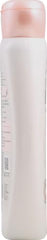 Garnier Whole Blends Gentle Shampoo Oat Delicacy pump bottle on bathroom counter