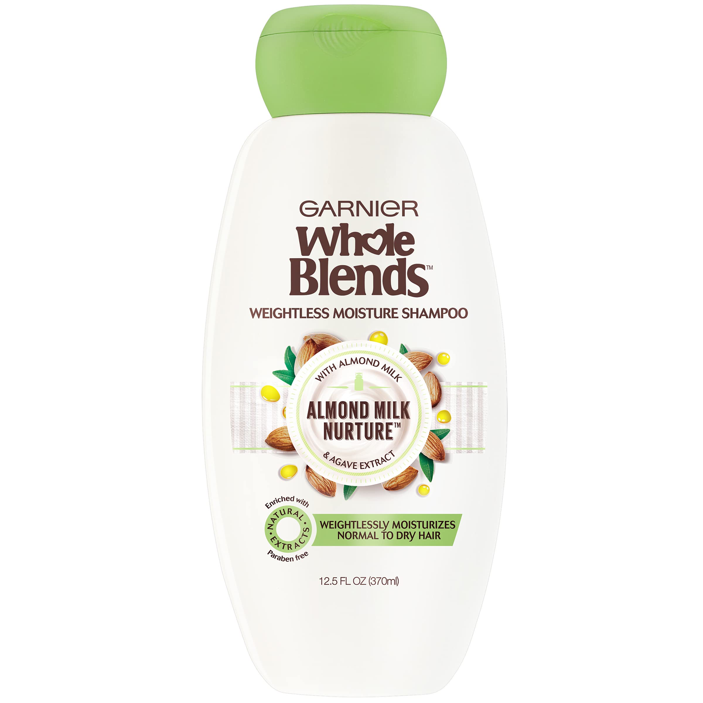 Garnier Whole Blends almond milk shampoo bottle close-up highlighting hydrating formula