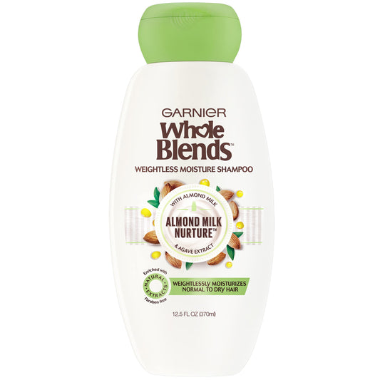 Garnier Whole Blends almond milk shampoo bottle close-up highlighting hydrating formula