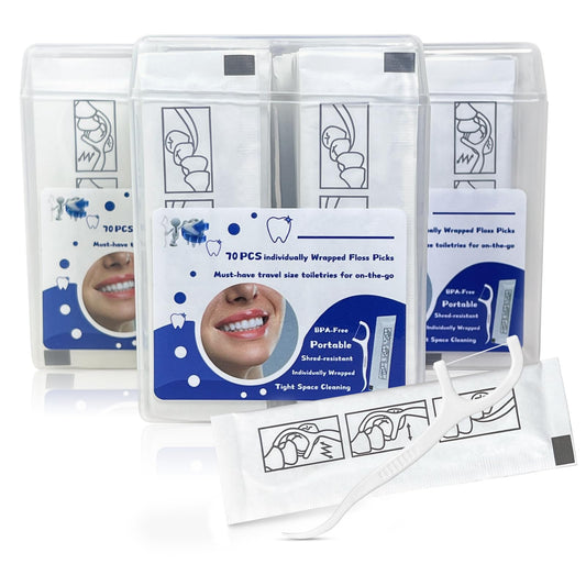Individually wrapped floss picks in recycled paper packaging for on-the-go use