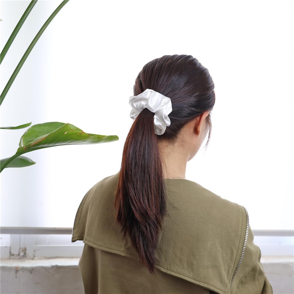Gebelle satin silk scrunchies in a bun for an elegant, practical hair accessory.