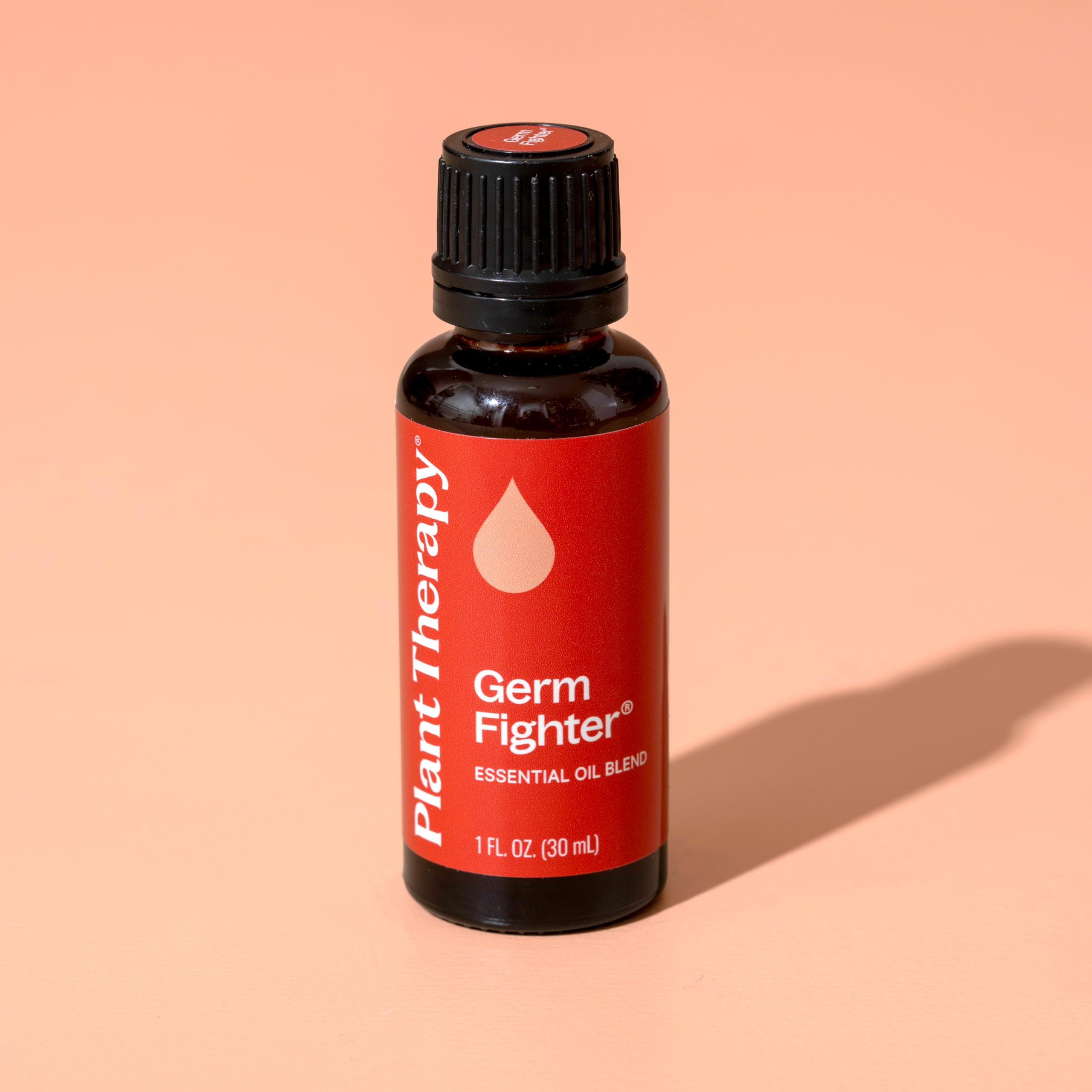 Germ Fighter bottle with carrier oil for massage