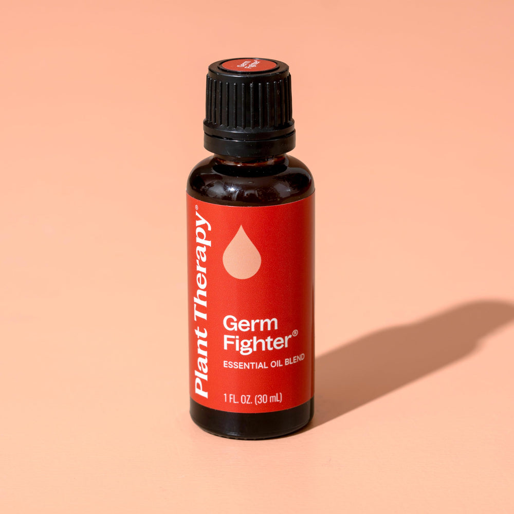 Germ Fighter bottle with carrier oil for massage