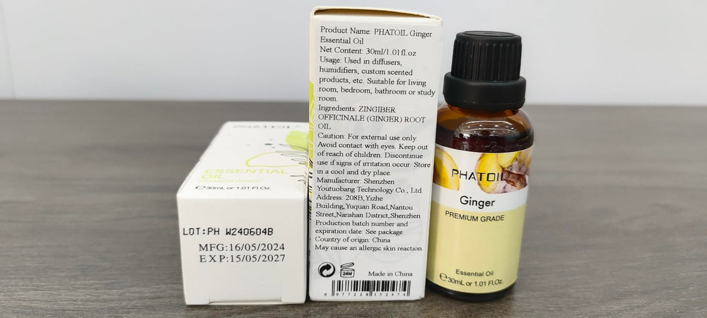 Close-up of ginger essential oil bottle label and dropper