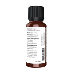 Close-up of ginger oil in an amber bottle