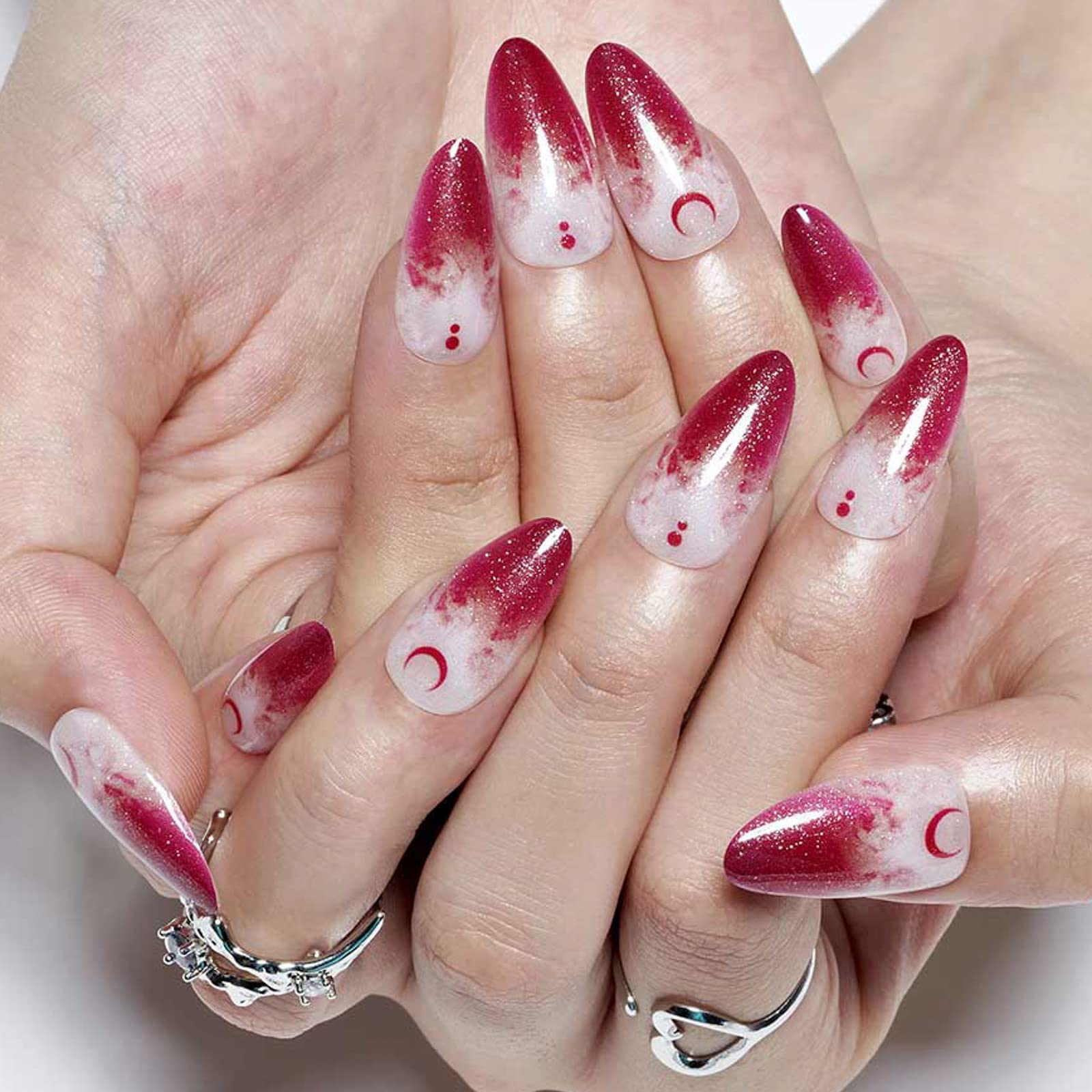 GLAMERMAID gothic moon short stiletto nails with UV gel finish.