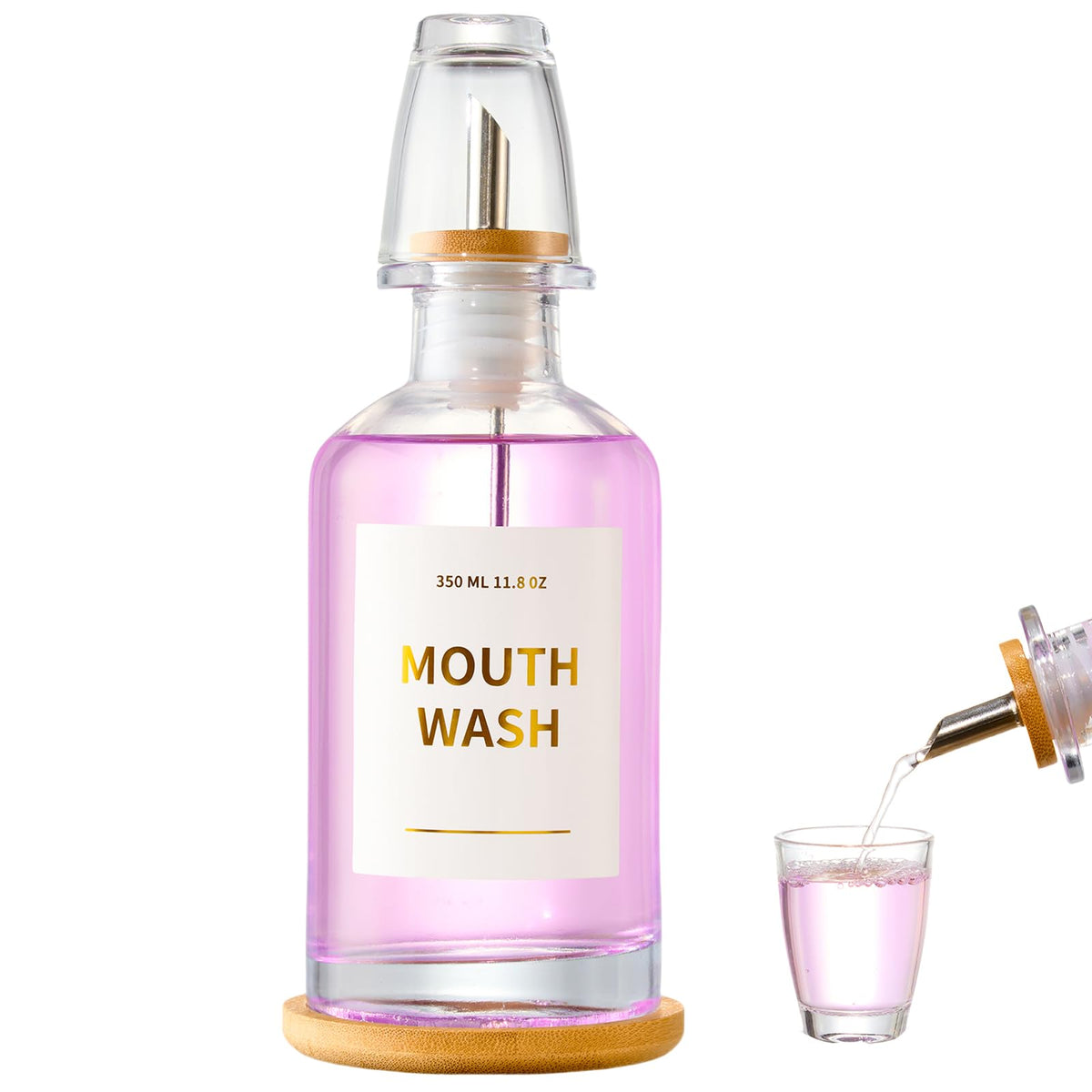 Glass mouthwash dispenser on a bamboo tray for bathroom decor
