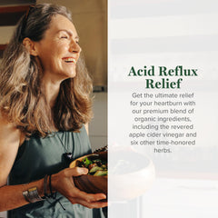 Global Healing Center Acid Reflux Relief liquid pour captured mid-use for heartburn relief