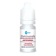 Globe Clotrimazole Solution compact bottle beside first-aid essentials for quick access.