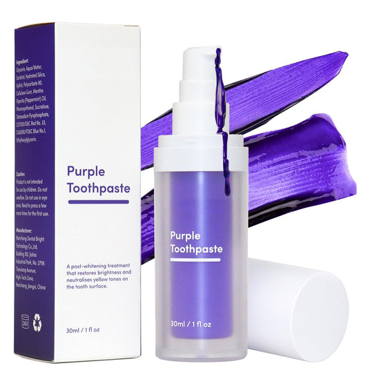 Toothbrush with GlorySmile purple toothpaste on bristles