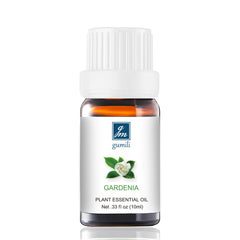 Close-up of Gardenia essential oil bottle with amber glass and inner dropper
