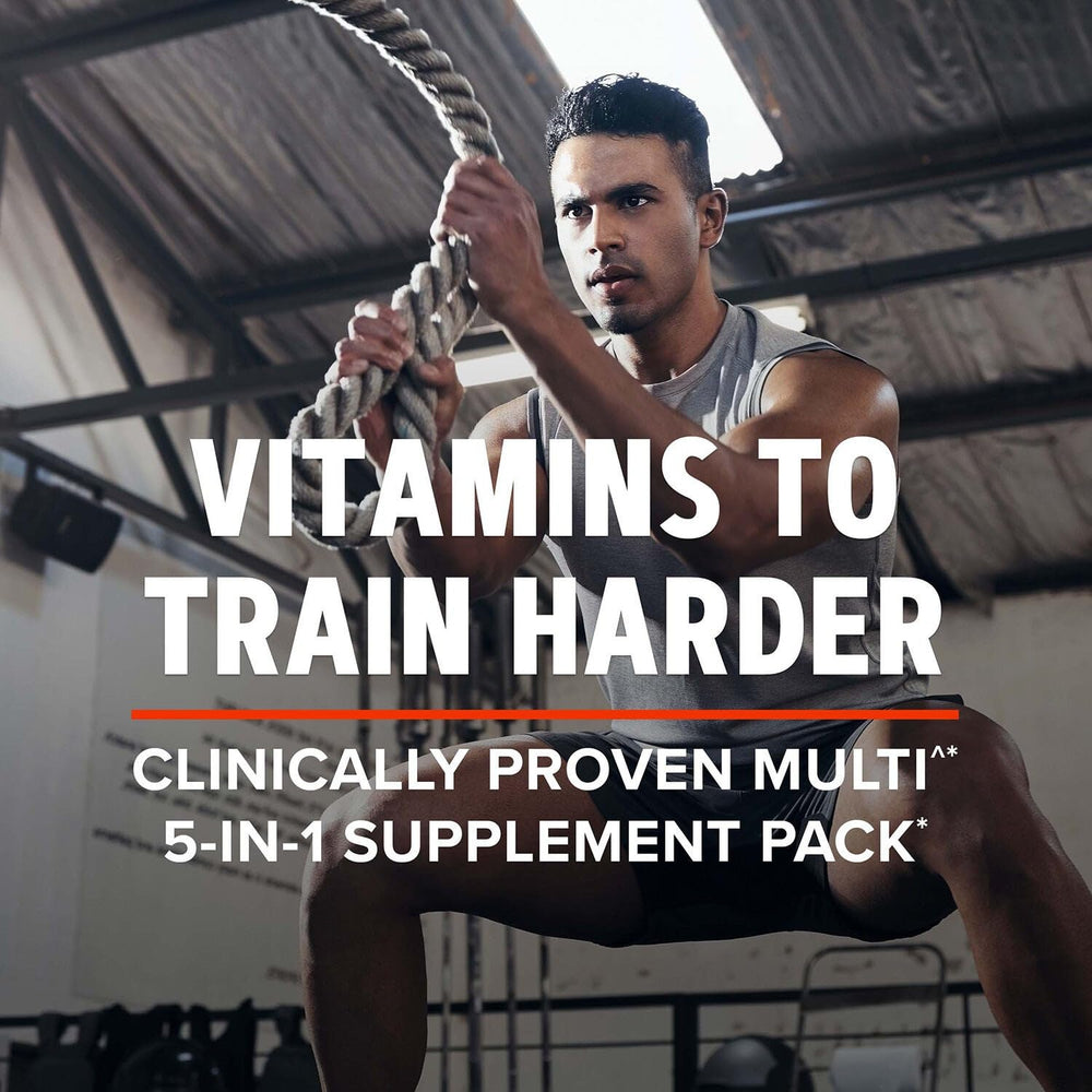 Packaging highlight of GNC AMP Men’s Vitapak showing 5-in-1 essentials