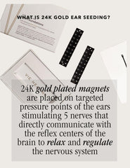 Gold ear seeds applied to an acupressure chart for guidance