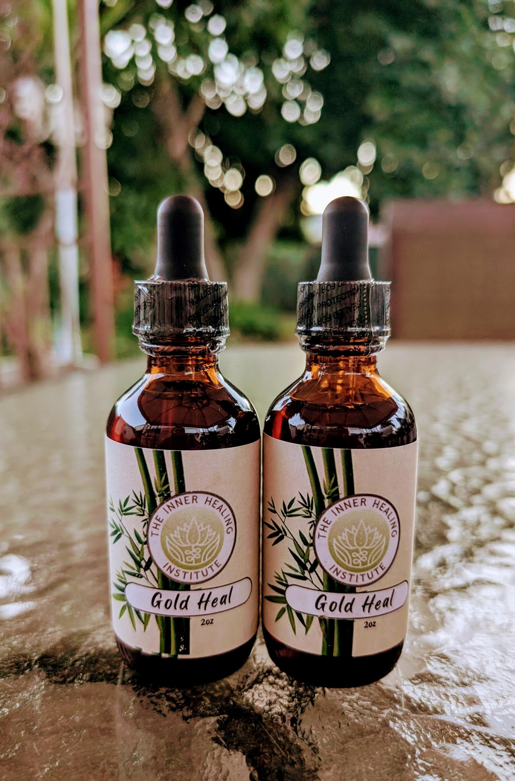 Close-up of dropper releasing tincture