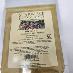 Assorted herbal powders including goldenseal on wooden surface