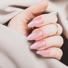 Goldfinger glazed long almond pearl nails for instant glam