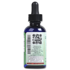 Close-up of zinc liquid bottle and label on white background
