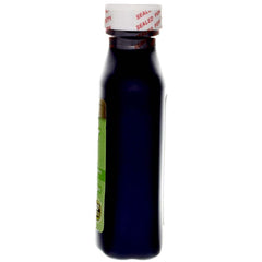 Castor oil drop on skin close-up