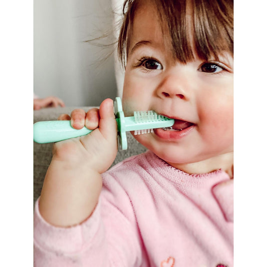 Close-up of dual-sided bristles on Grabease toddler toothbrush