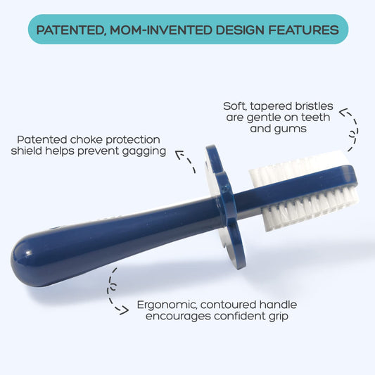 Close-up of Grabease navy toothbrush displaying double-sided bristles