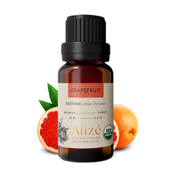 Dark glass bottle of grapefruit essential oil with dropper
