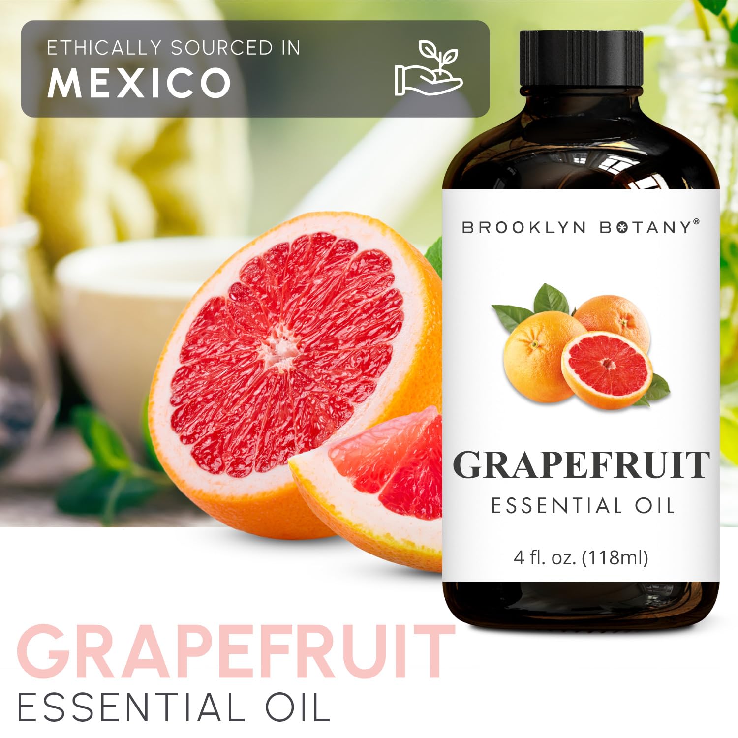 Close-up of grapefruit essential oil in amber glass bottle