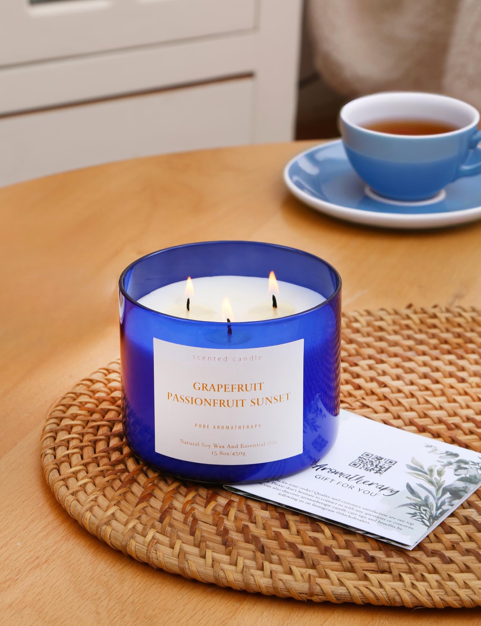 Blue glass jar repurposed as decorative vase