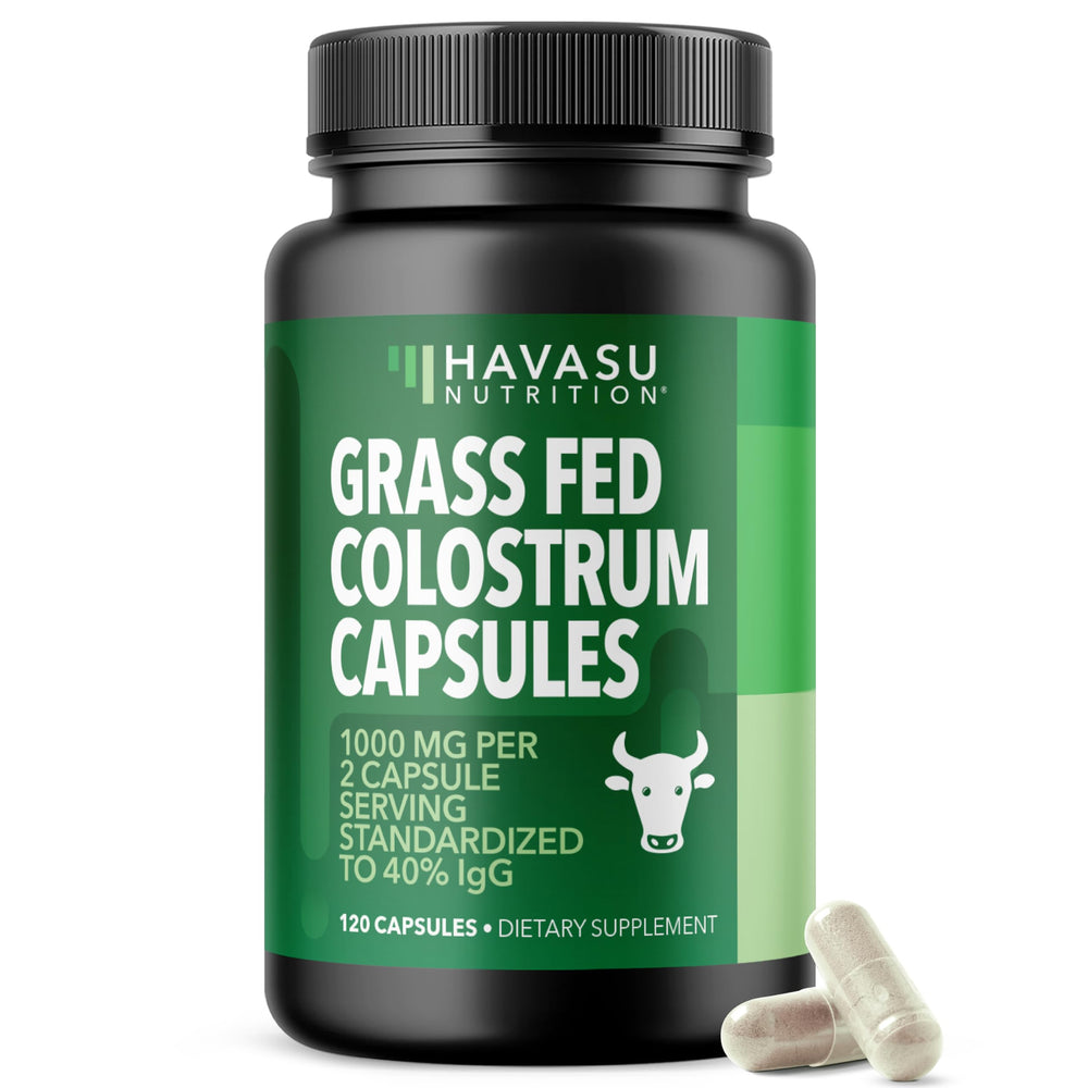 Grass Fed Colostrum supplement bottle with capsules on white background