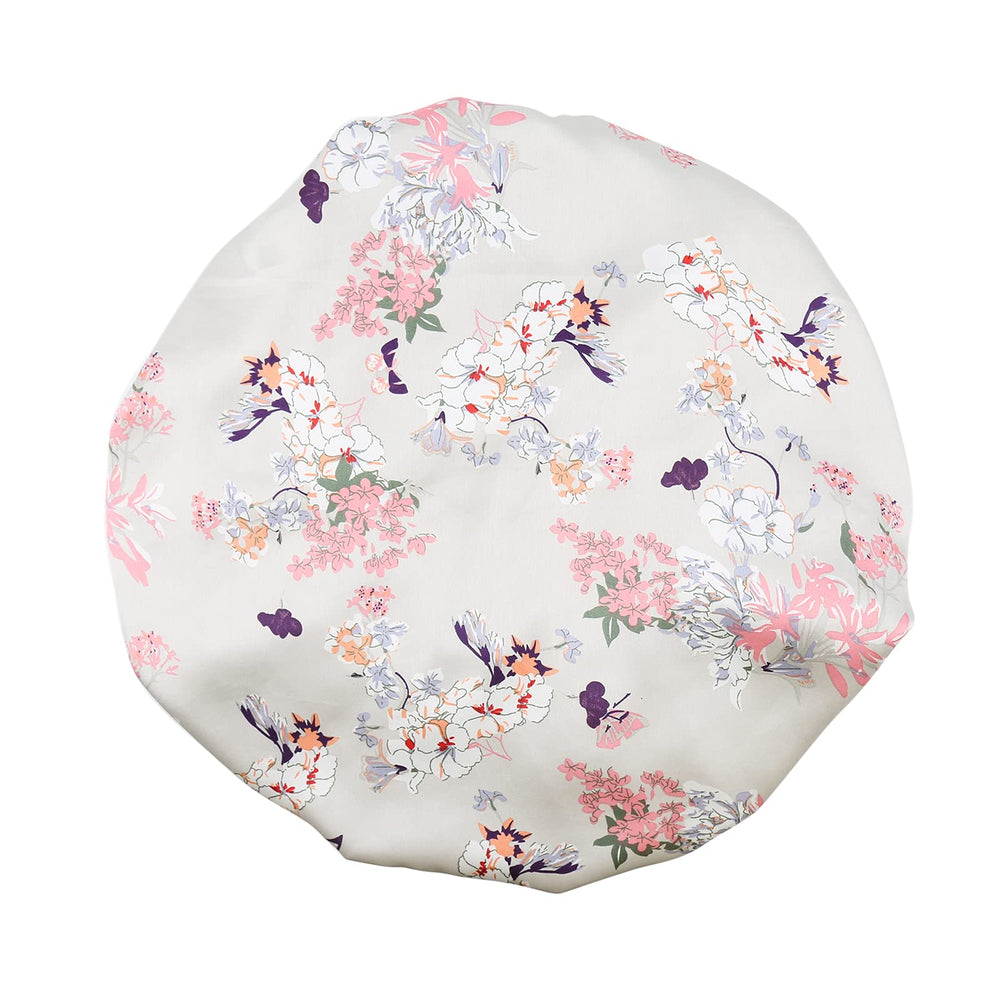 GreatRemy satin braid bonnet with silver flowers seen from the front, for hair protection while sleeping