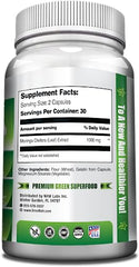 Capsules inside a bottle of Moringa Oleifera supplement