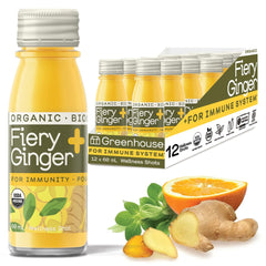 Greenhouse Juice Co Fiery Ginger Turmeric shot bottle for on-the-go wellness.