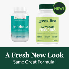 Probiotic capsules with a glass of water illustrating daily serving