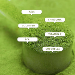 Greens Strawberry powder being added to a smoothie