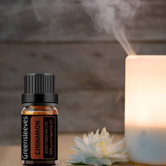 GREENSLEEVES cinnamon oil used in candle making for inviting fragrance.