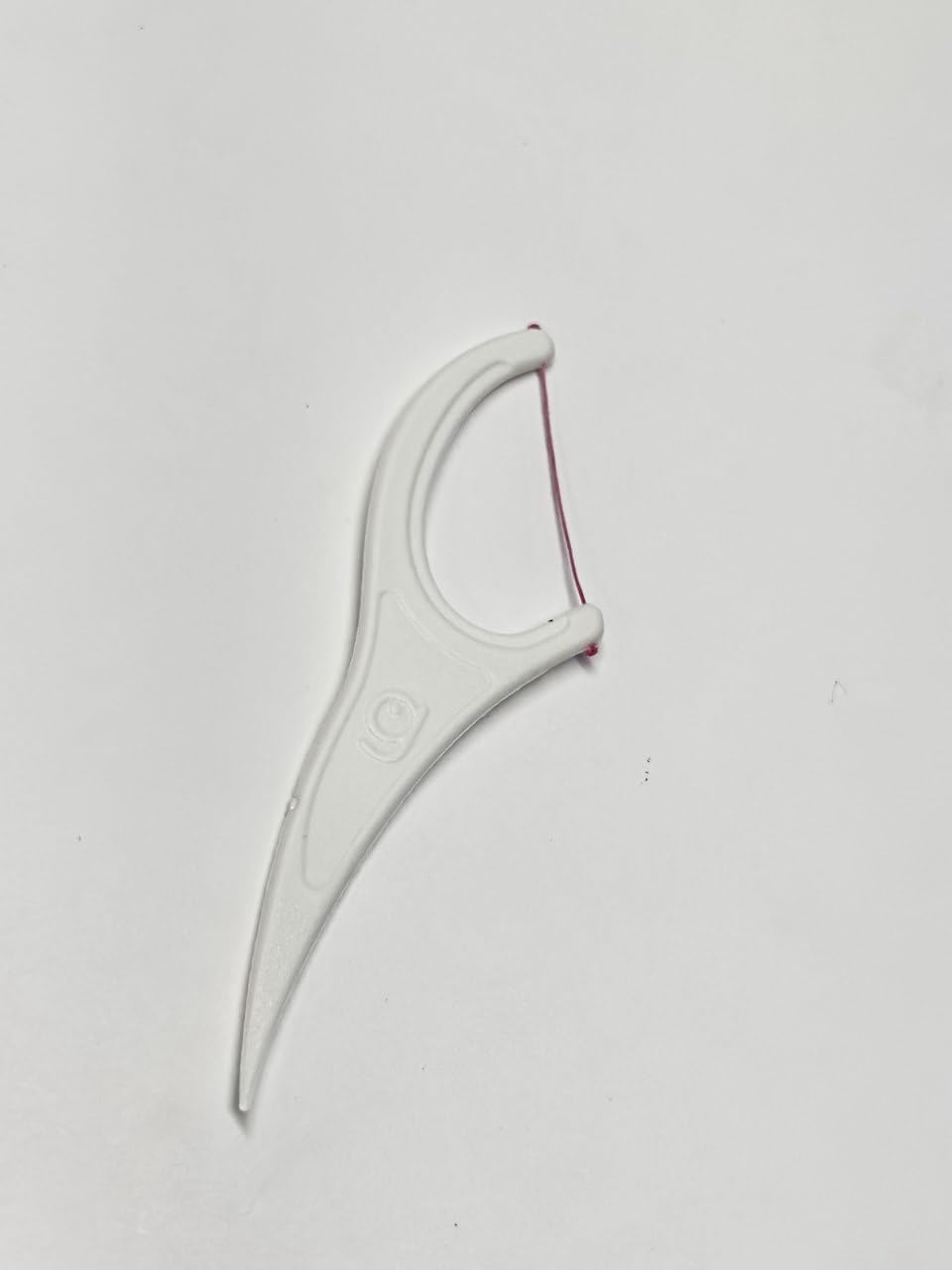 Close-up of Grin Smooth Floss Tape easy-grip handle