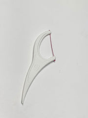 Close-up of Grin Smooth Floss Tape easy-grip handle