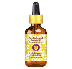 Amber glass bottle with dropper containing Guaiacwood essential oil