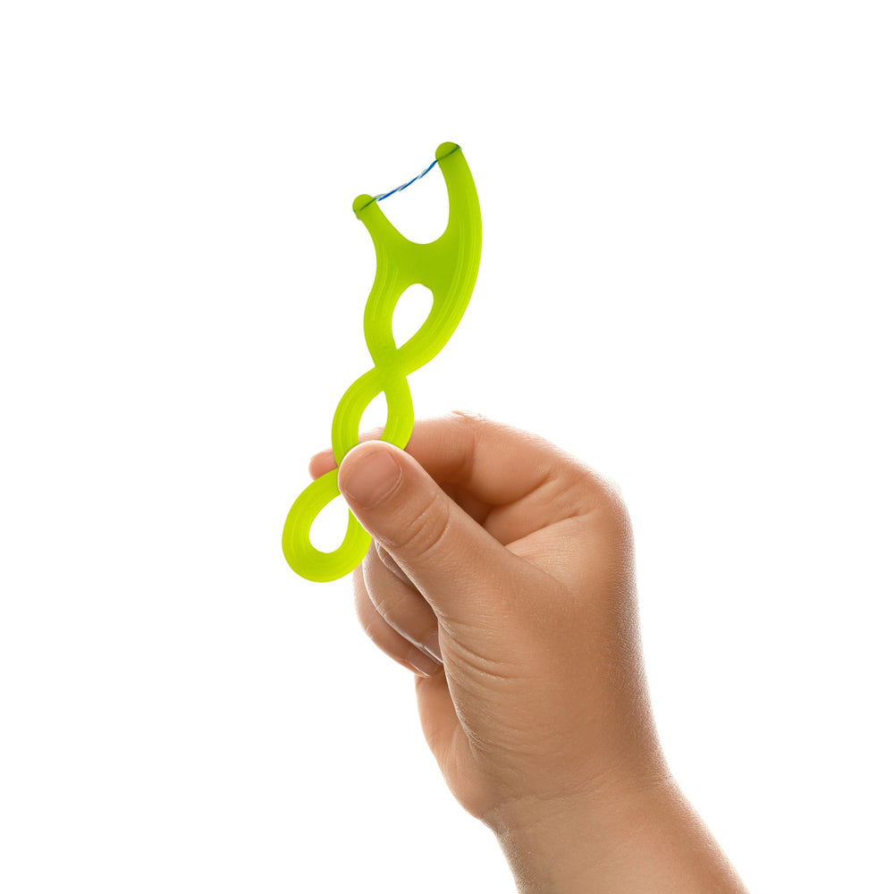 Close-up of shred-resistant floss on kids flossers